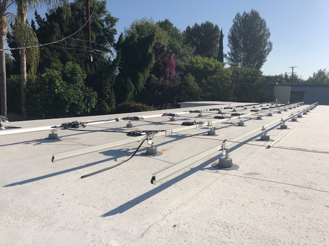 solar power flat roof- California Skyline Remodeling